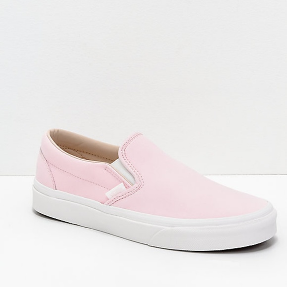 pink and white slip on vans
